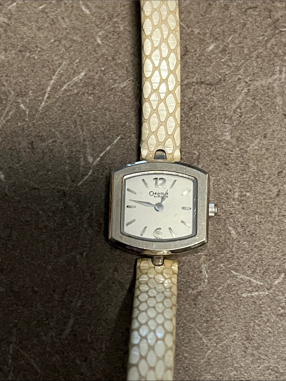 Ladies Bulova Caravelle Cream Textured Strap Ladies Watch Needs battery
